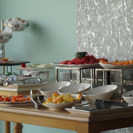 Quo Quality Hotel มานิซาเลส ภายนอก รูปภาพ A buffet
