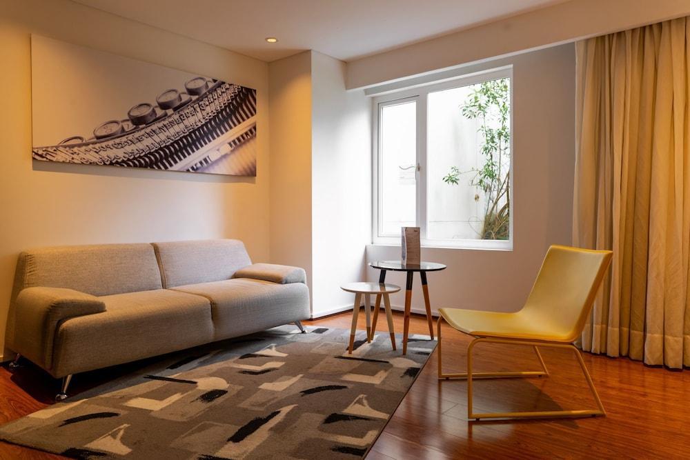 Quo Quality Hotel มานิซาเลส ภายนอก รูปภาพ A living room in a hotel