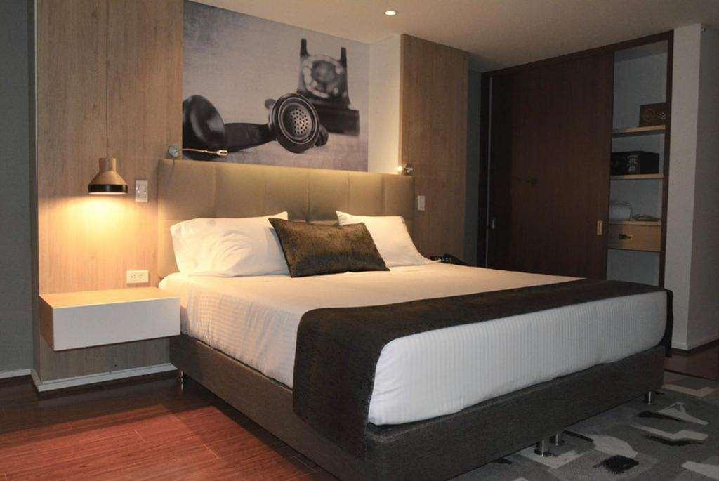 Quo Quality Hotel มานิซาเลส ห้อง รูปภาพ A bedroom at the hotel