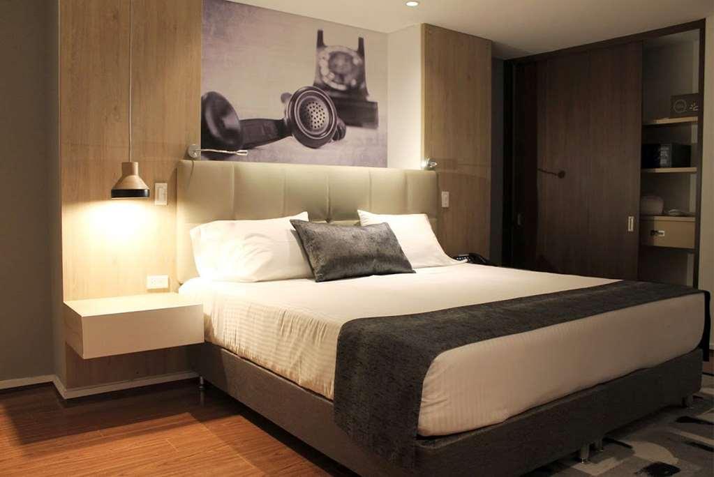 Quo Quality Hotel มานิซาเลส ห้อง รูปภาพ A bedroom at the hotel