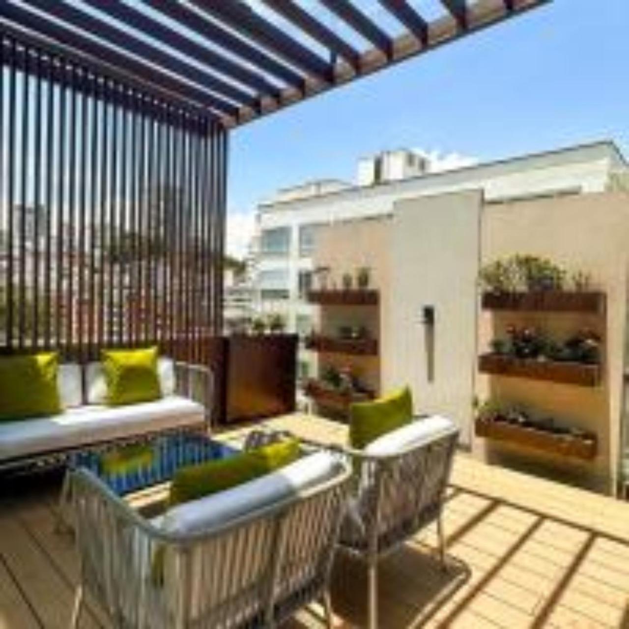 Quo Quality Hotel มานิซาเลส ภายนอก รูปภาพ A rooftop garden