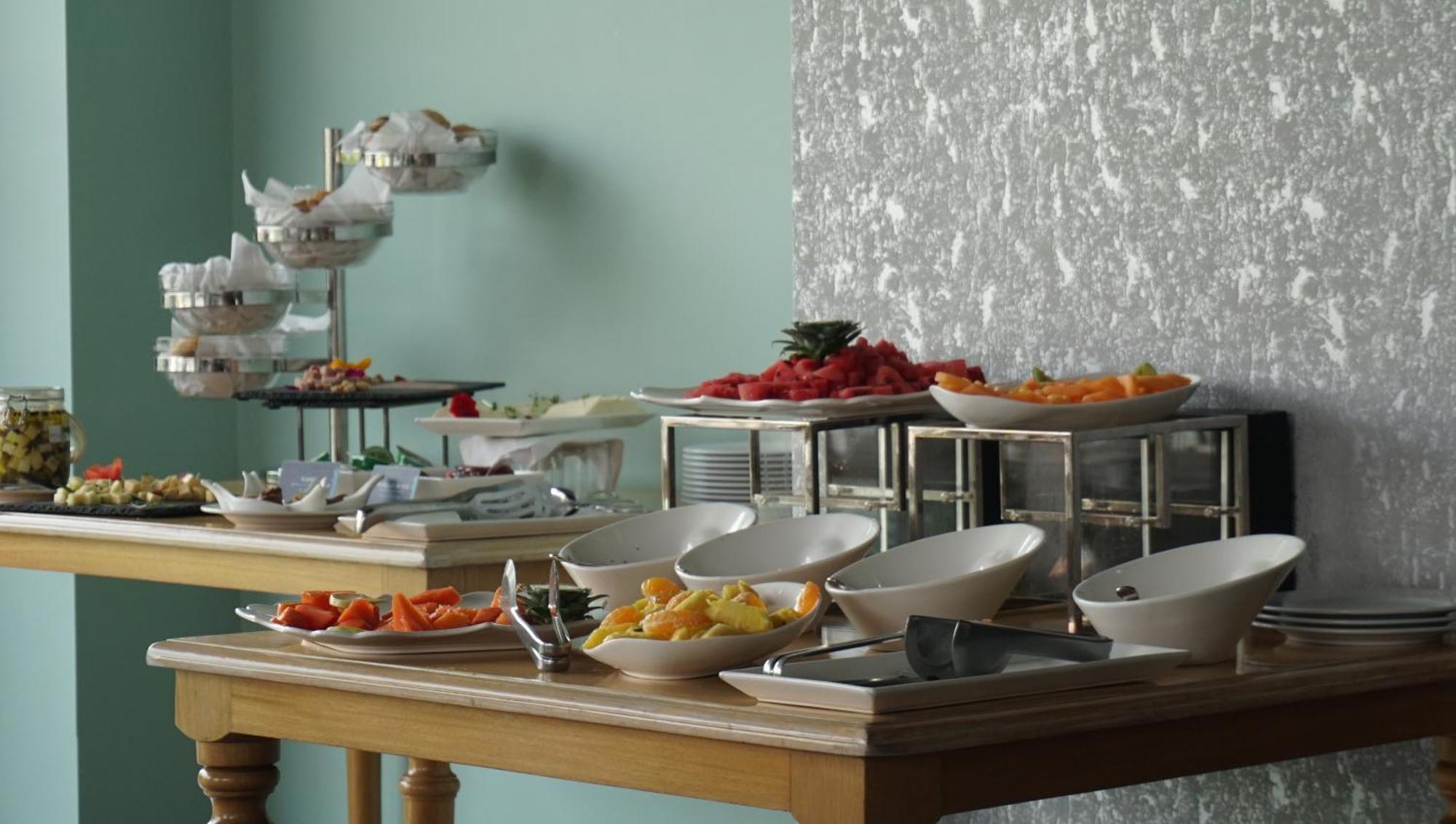 Quo Quality Hotel มานิซาเลส ภายนอก รูปภาพ A buffet