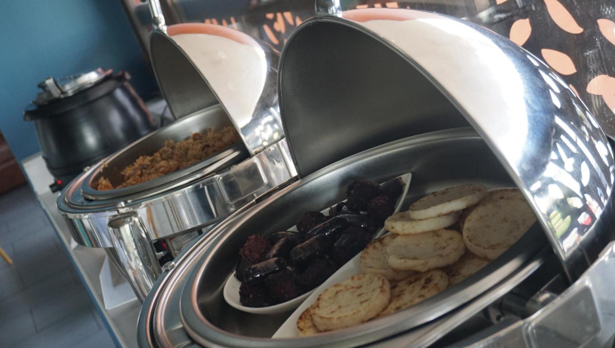 Quo Quality Hotel มานิซาเลส ภายนอก รูปภาพ A chafing dish