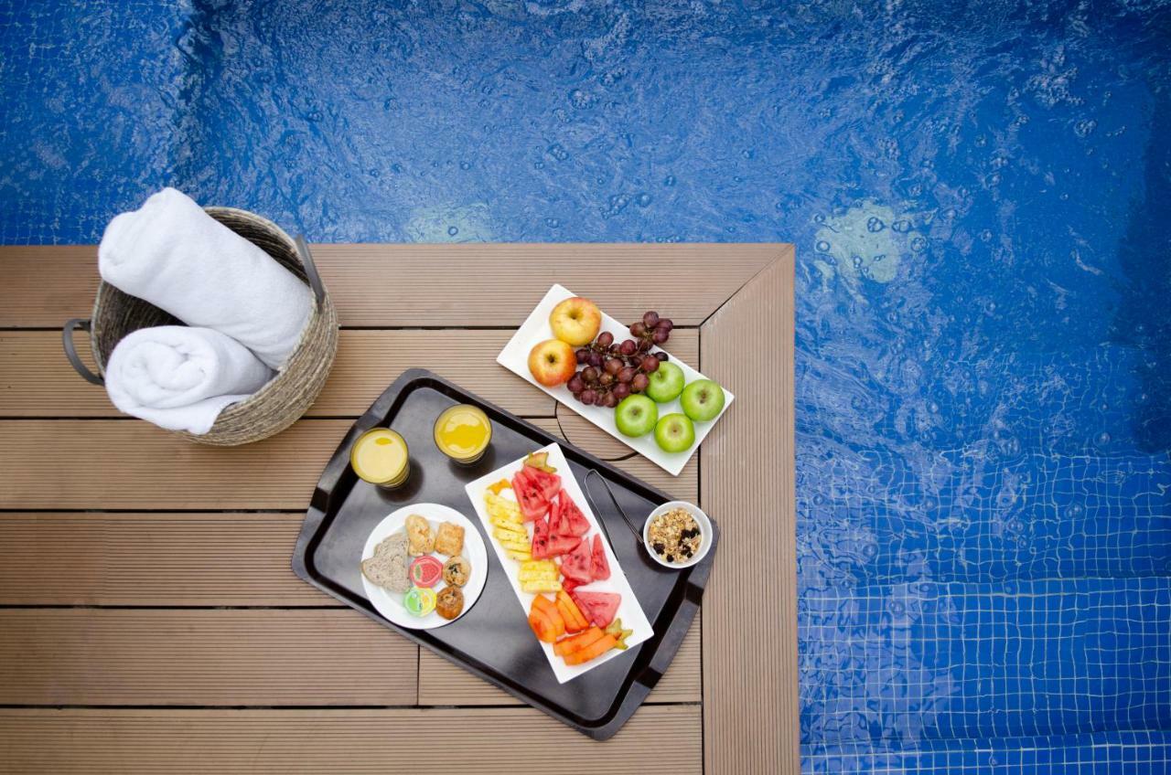 Quo Quality Hotel มานิซาเลส ภายนอก รูปภาพ A poolside snack